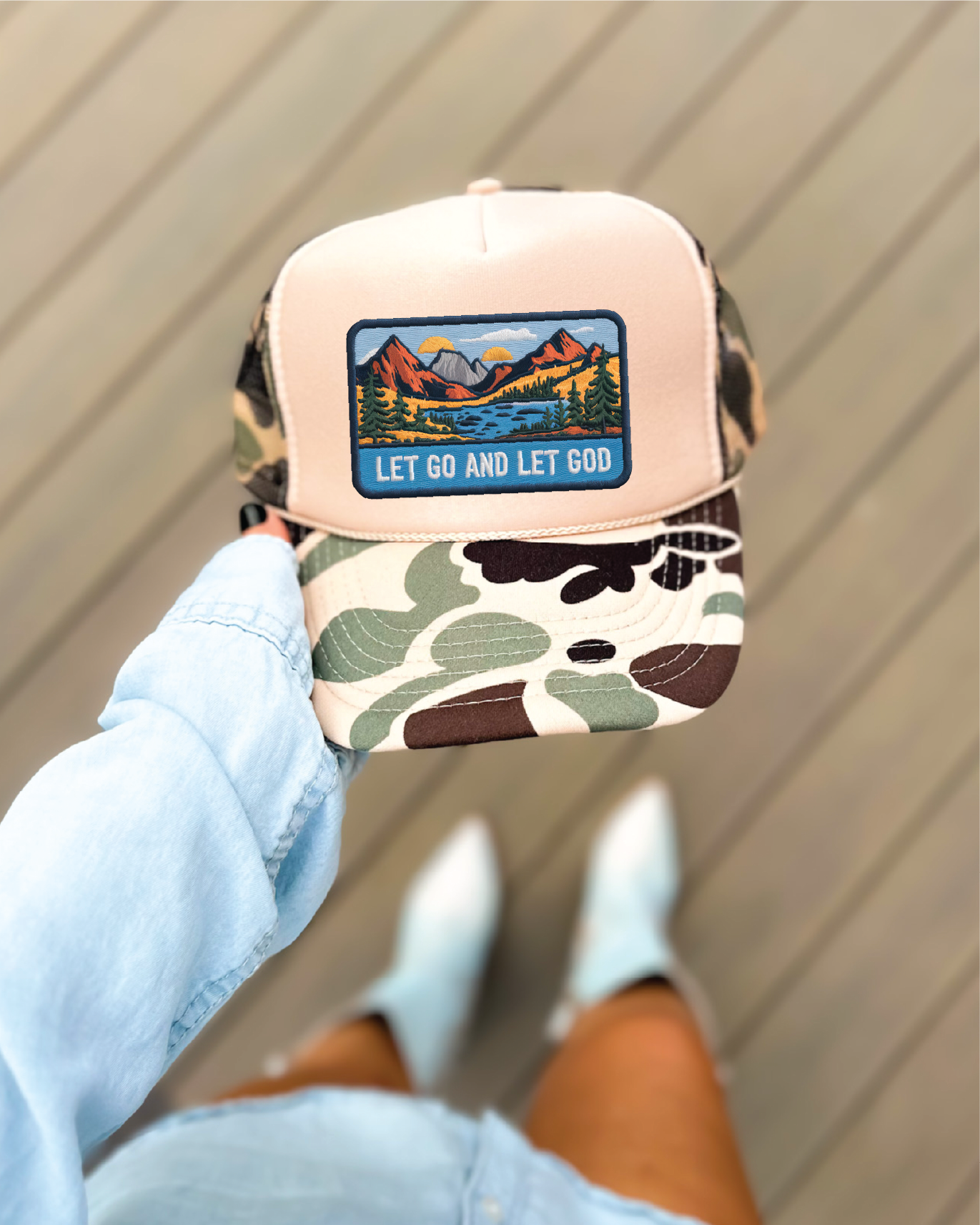 Let Go Let God DTF Printed on A Duck Camo and Tan Trucker Hat